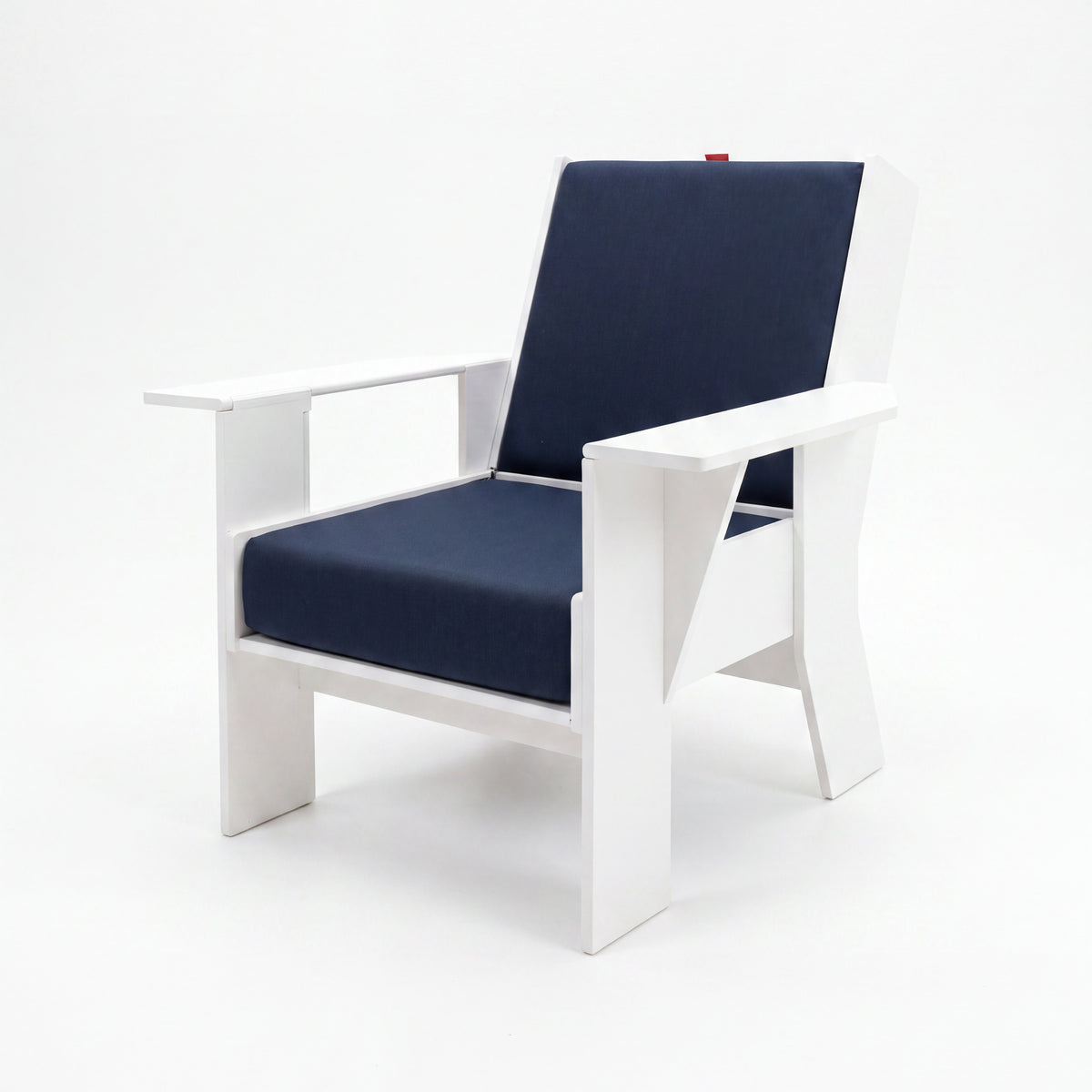FOLDEN Club Chair with a white frame and navy blue cushions on a white background