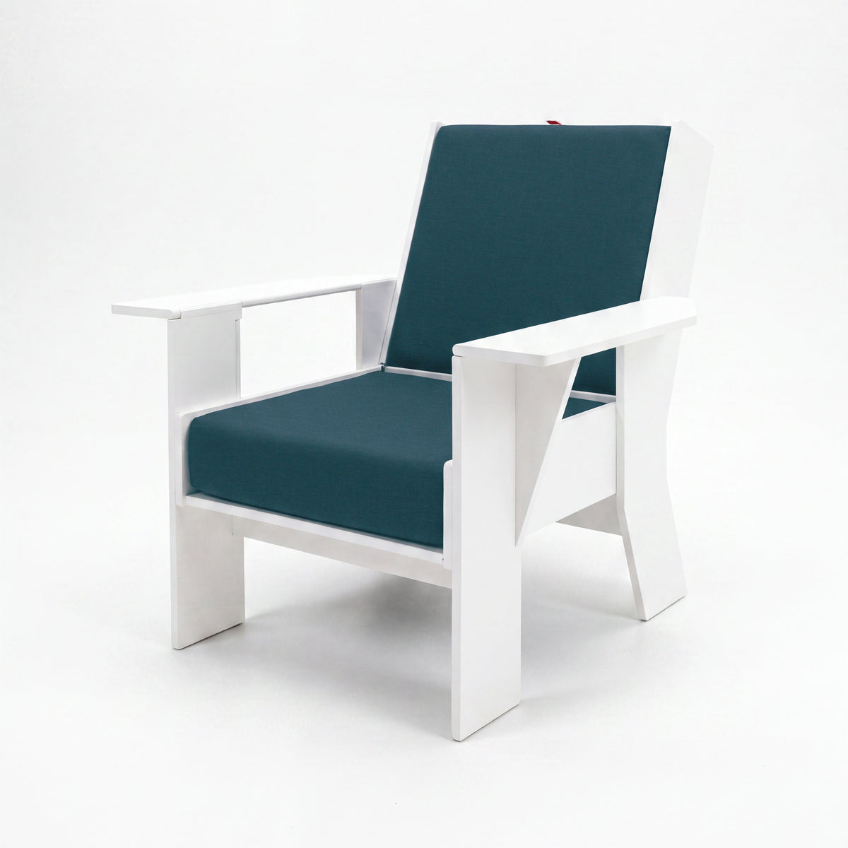 FOLDEN Club Chair with a white frame and Cast Lagoon cushions