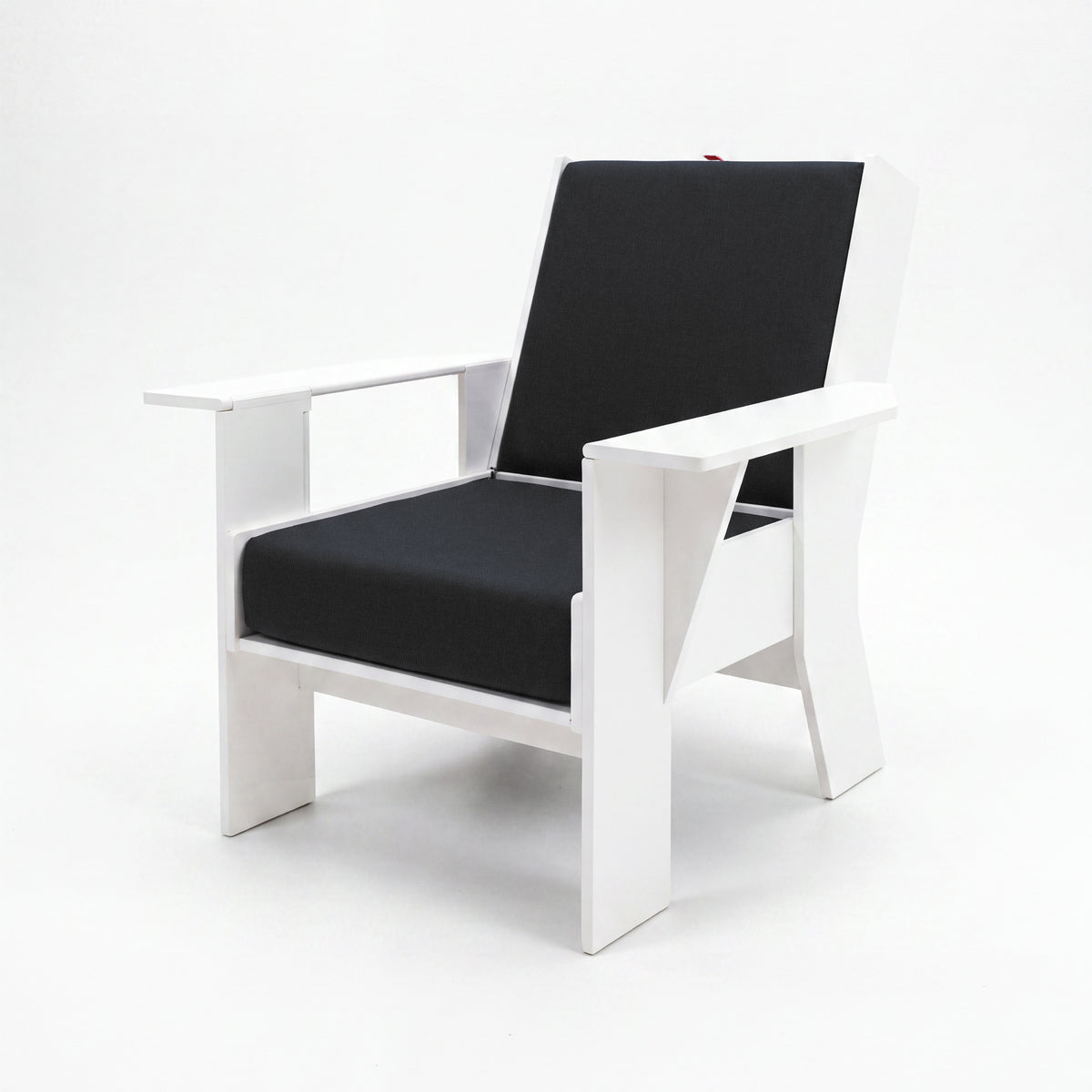 FOLDEN Club Chair with a white frame and Spectrum Carbon cushions