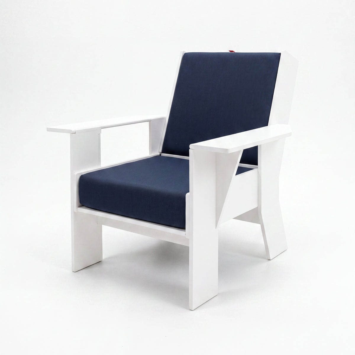 FOLDEN Club Chair with a white frame and Spectrum Indigo cushions